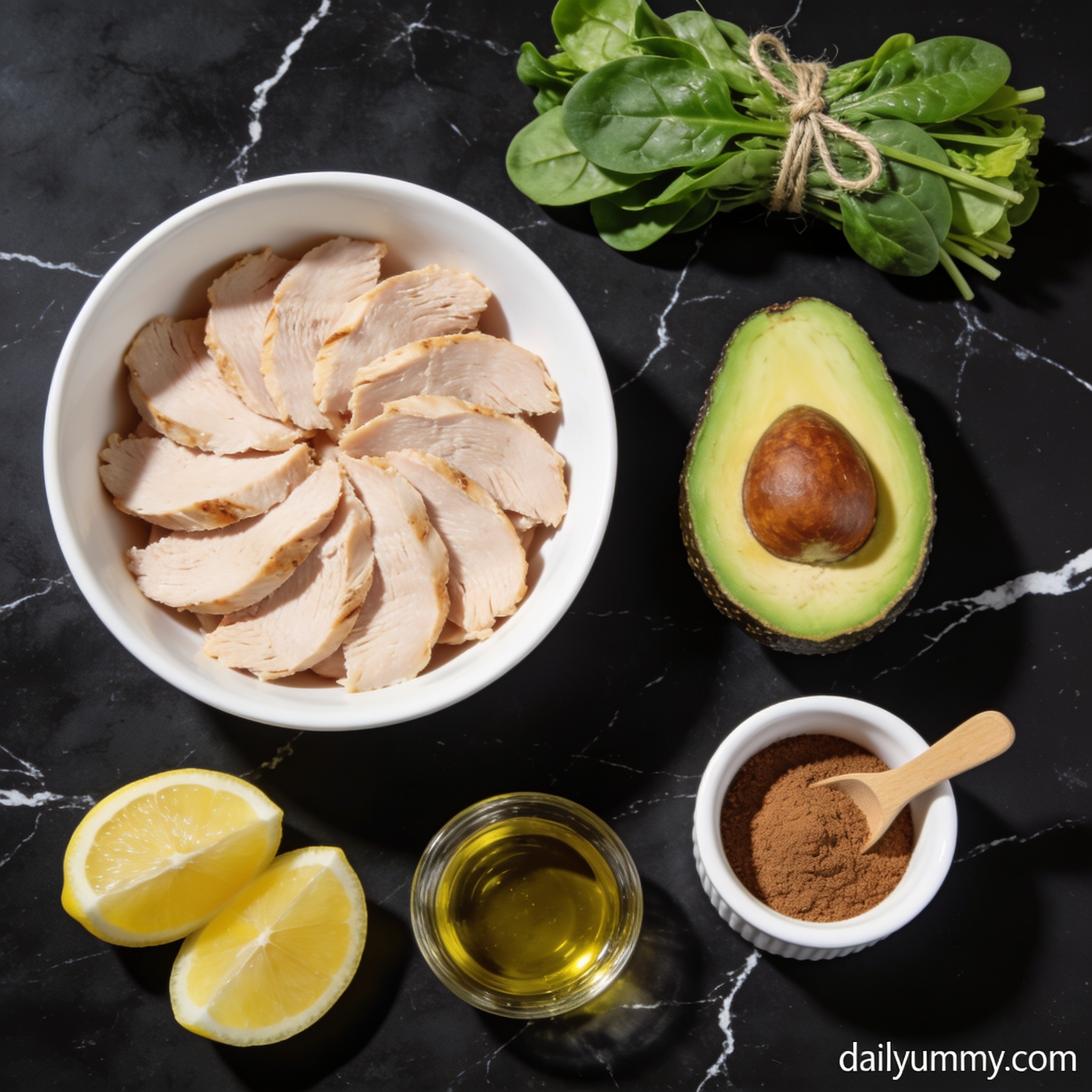 All ingredients for high protein turkey and avocado salad with cinnamon arranged in proper containers on black marble countertop